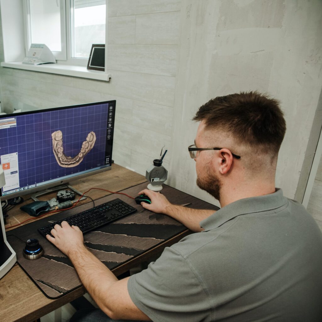 Photo of a 3D modeler at work.