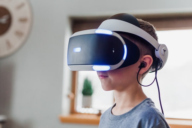 A child wearing a VR headset - How to make a VR game in Unreal Engine