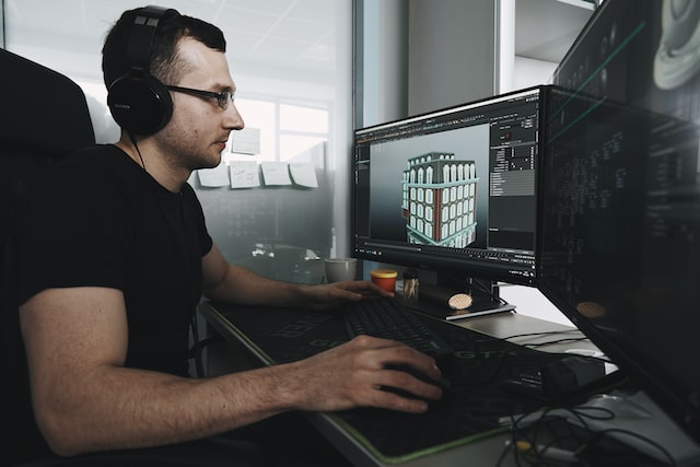 A man modeling a 3D asset through the aid of a computer- How to design 3D games