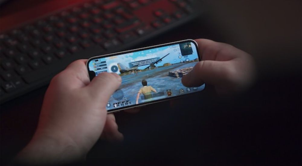 Someone playing a mobile game on smartphone