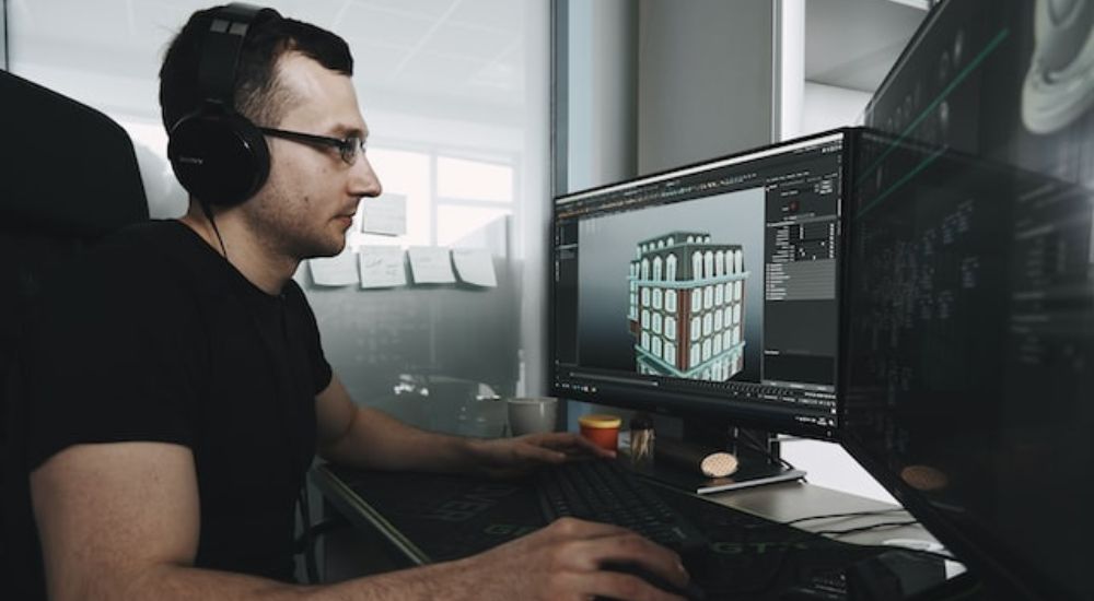 a man designing a 3D game
