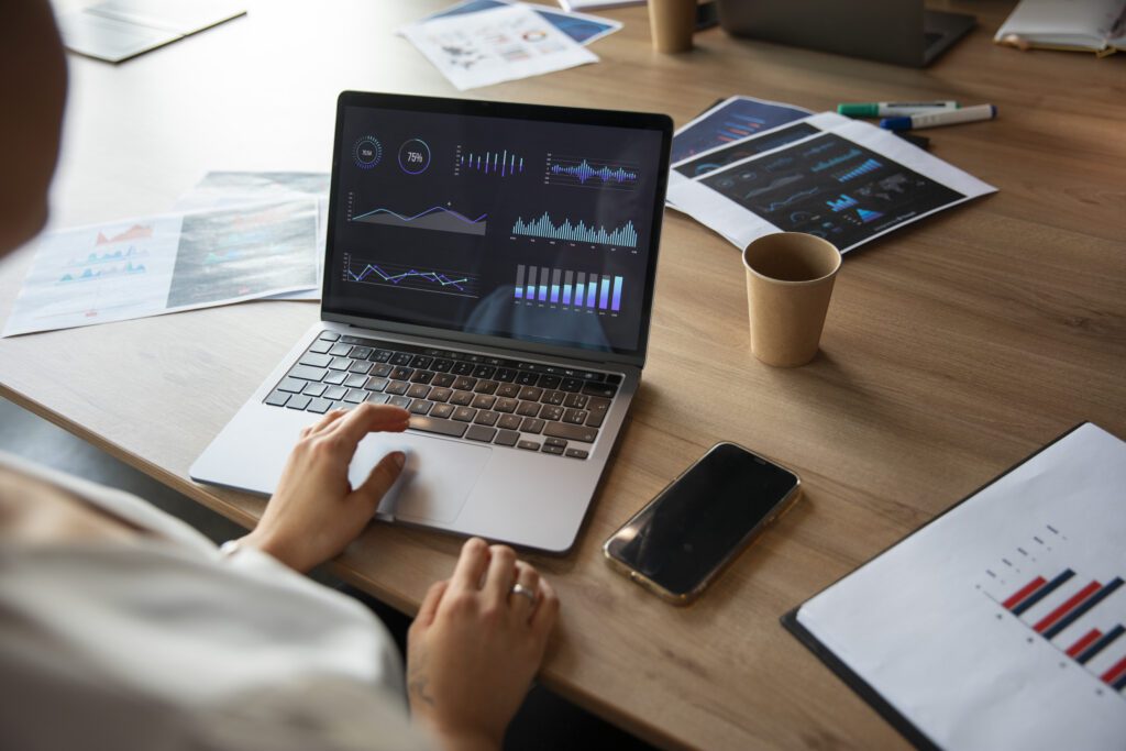 From CODE to the Cloud: How Metaverse Developers Are Speeding Up Game Production by 40% 2 office workers using finance graphs
