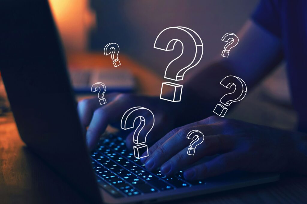 many quiestion marks computer find answer online faq concept what where when how why search information internet